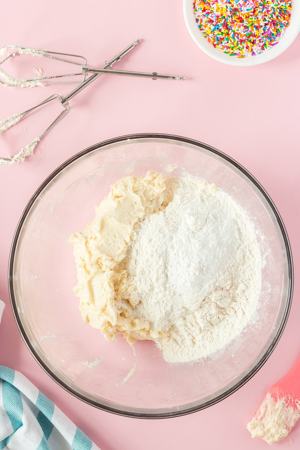 Dry mixture and wet mixture to make cookies in a bowl.