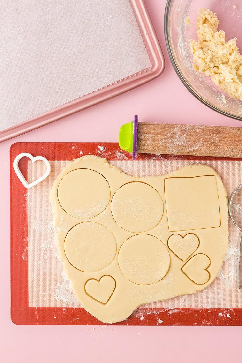 Shaped cut in to cookie dough by a rolling pin. 