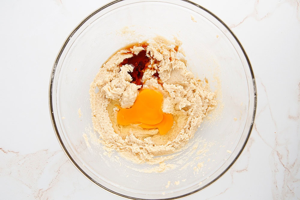 Cookie batter with eggs and vanilla added in.
