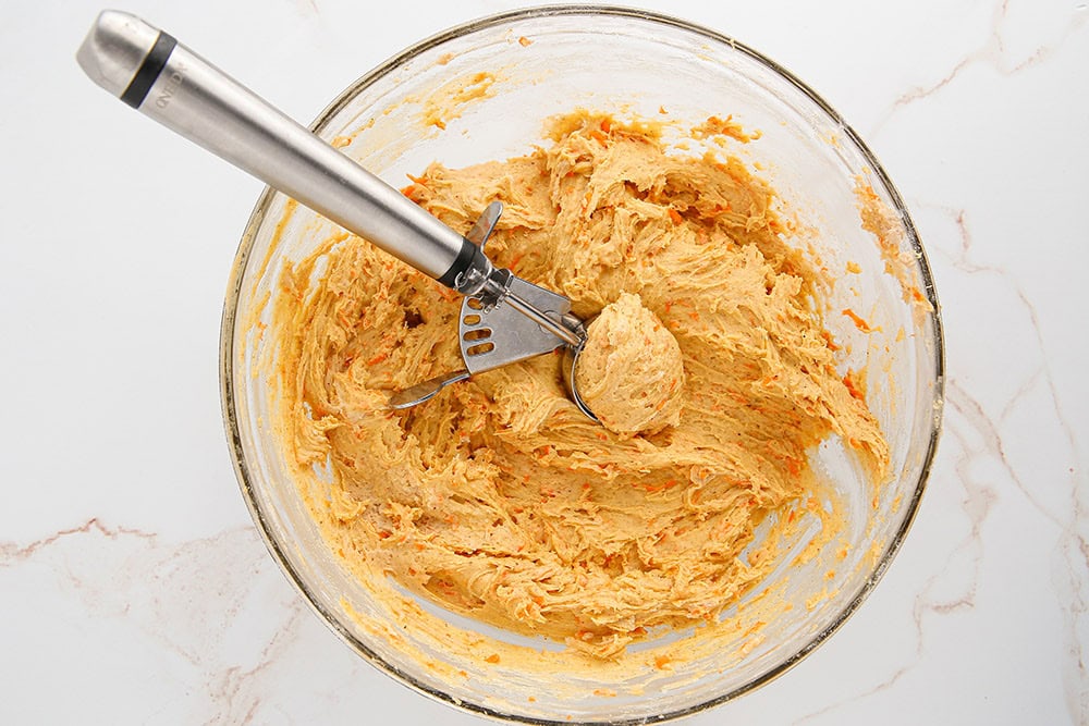 Batter with a cookie scoop in it. 