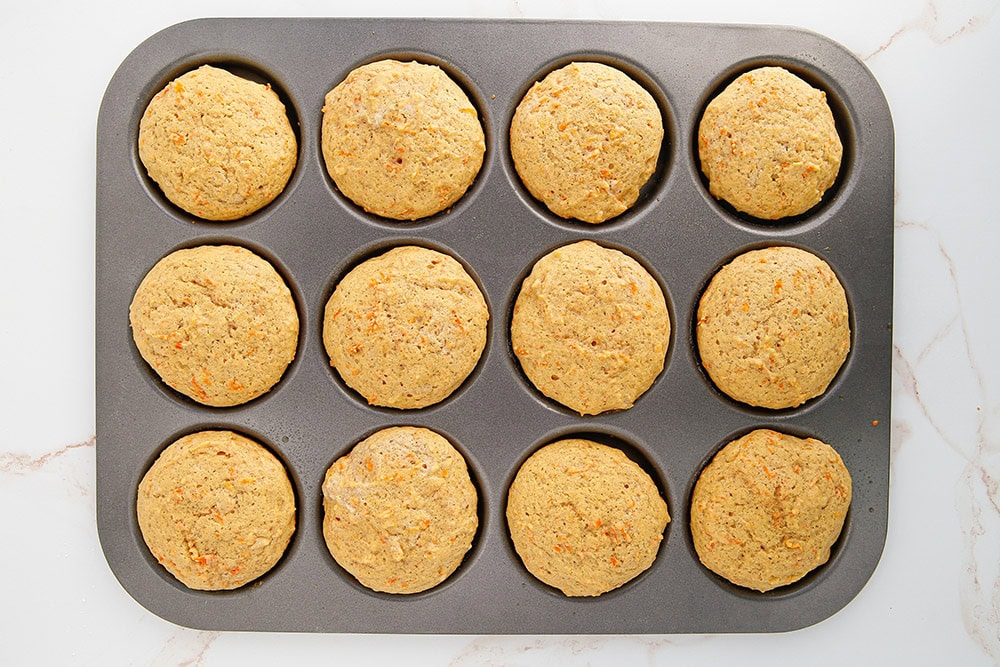 Baked whoopie pie tops in a baking sheet. 