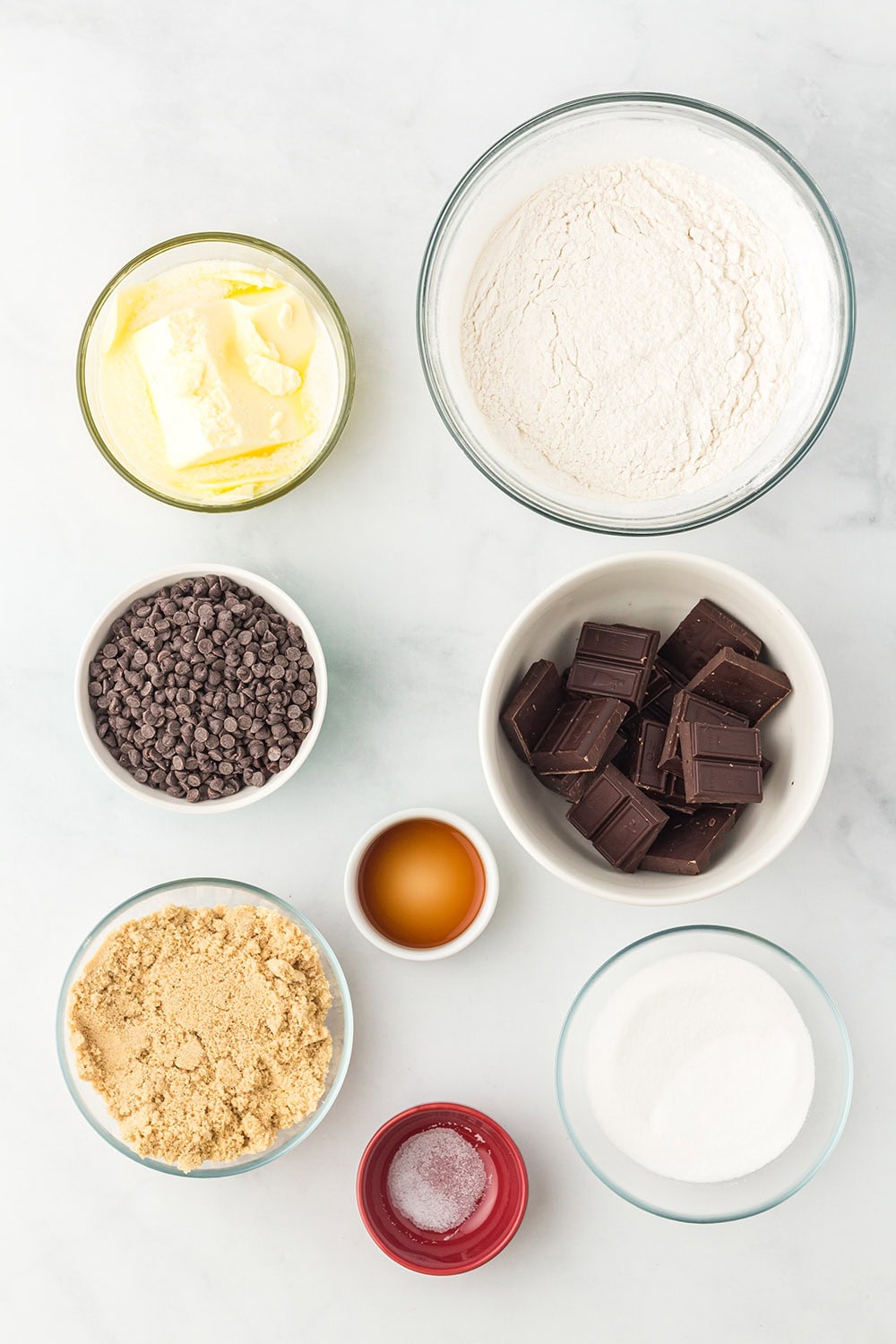 Butter, chocolate chips, and other ingredients in bowls.