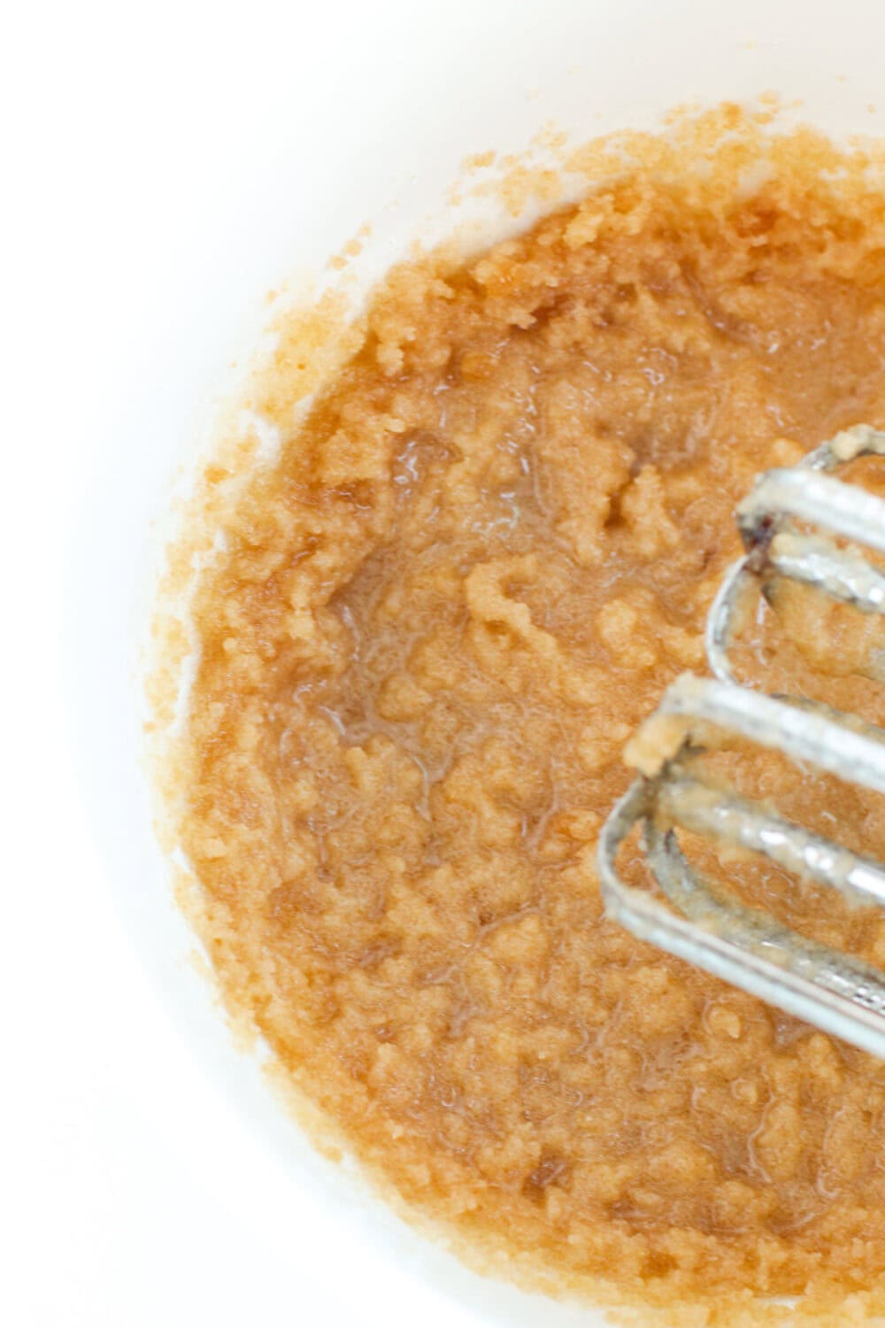 Cookie batter with mixers in it.