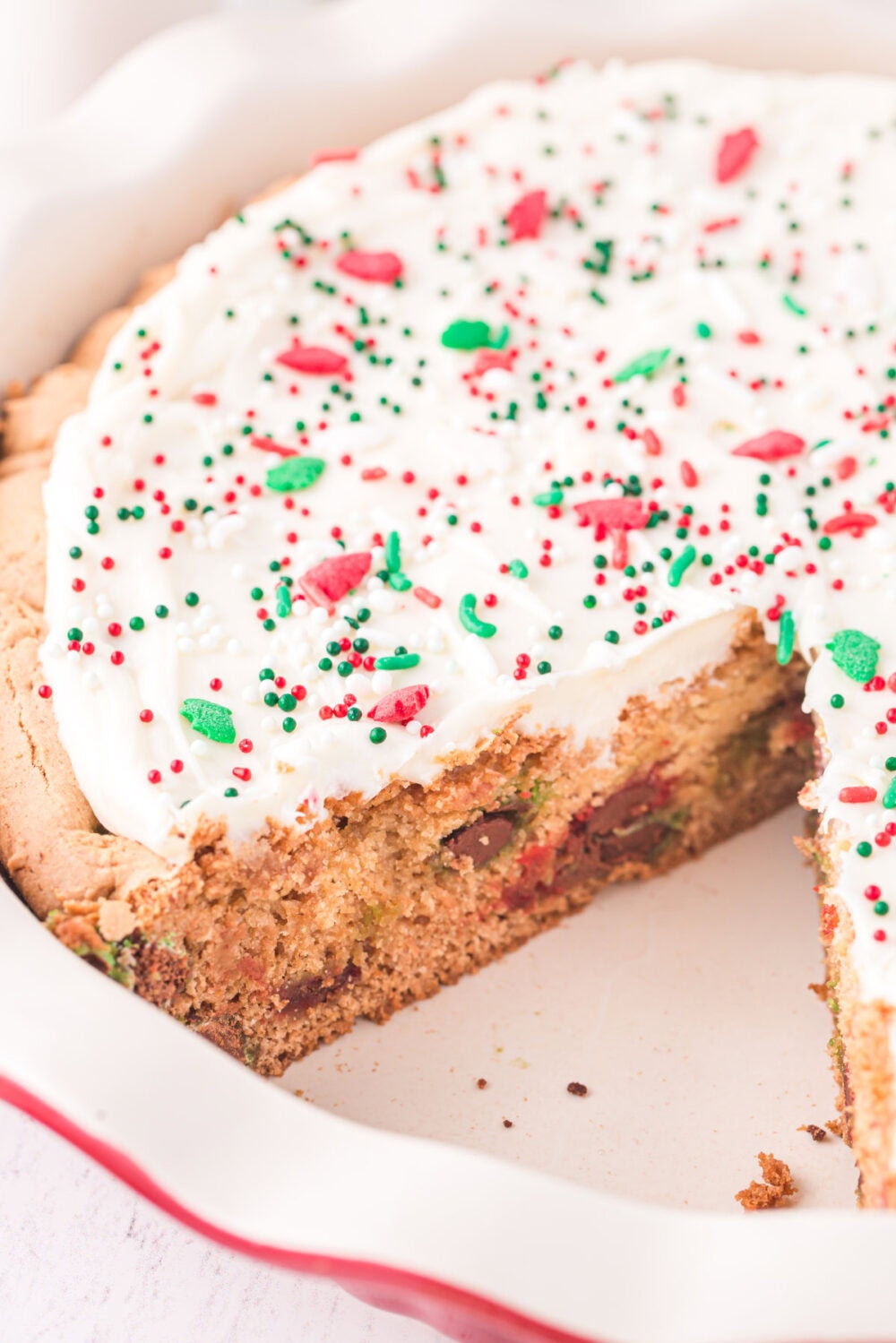 Holiday sugar cookie pie with a slice taken out.