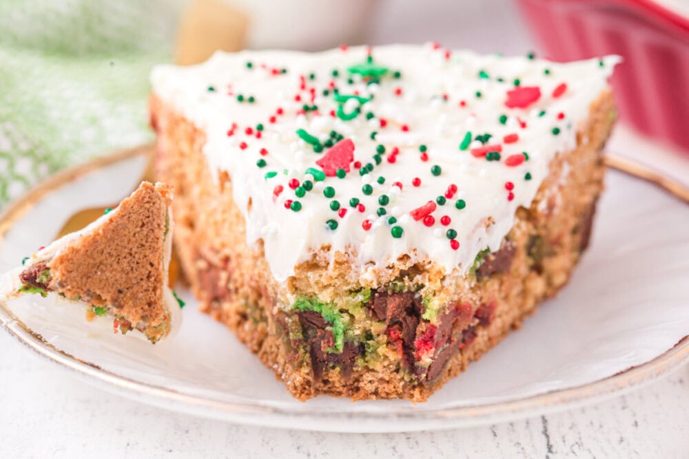 Slice of holiday sugar cookie pie with a bite taken out.
