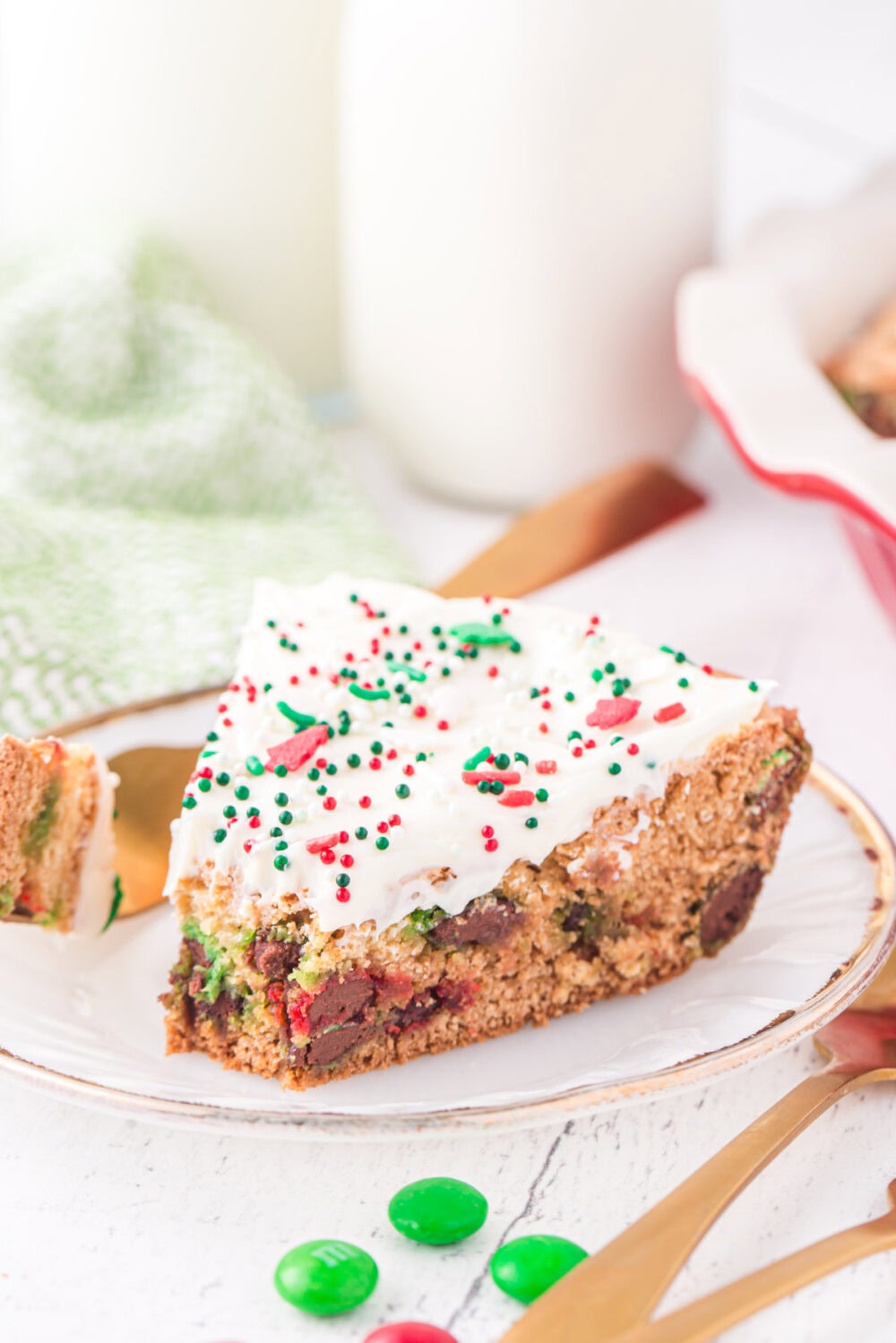 Slice of sugar cookie pie with a forkfull out of it.