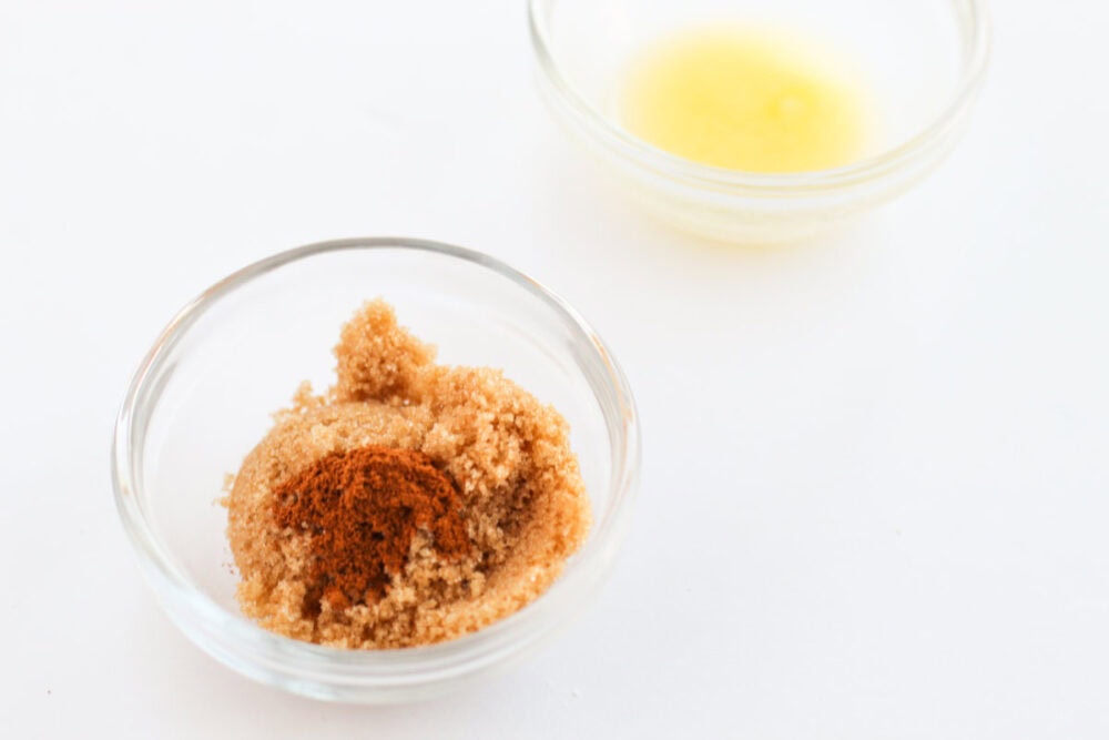 Cinnamon and butter in little dishes.