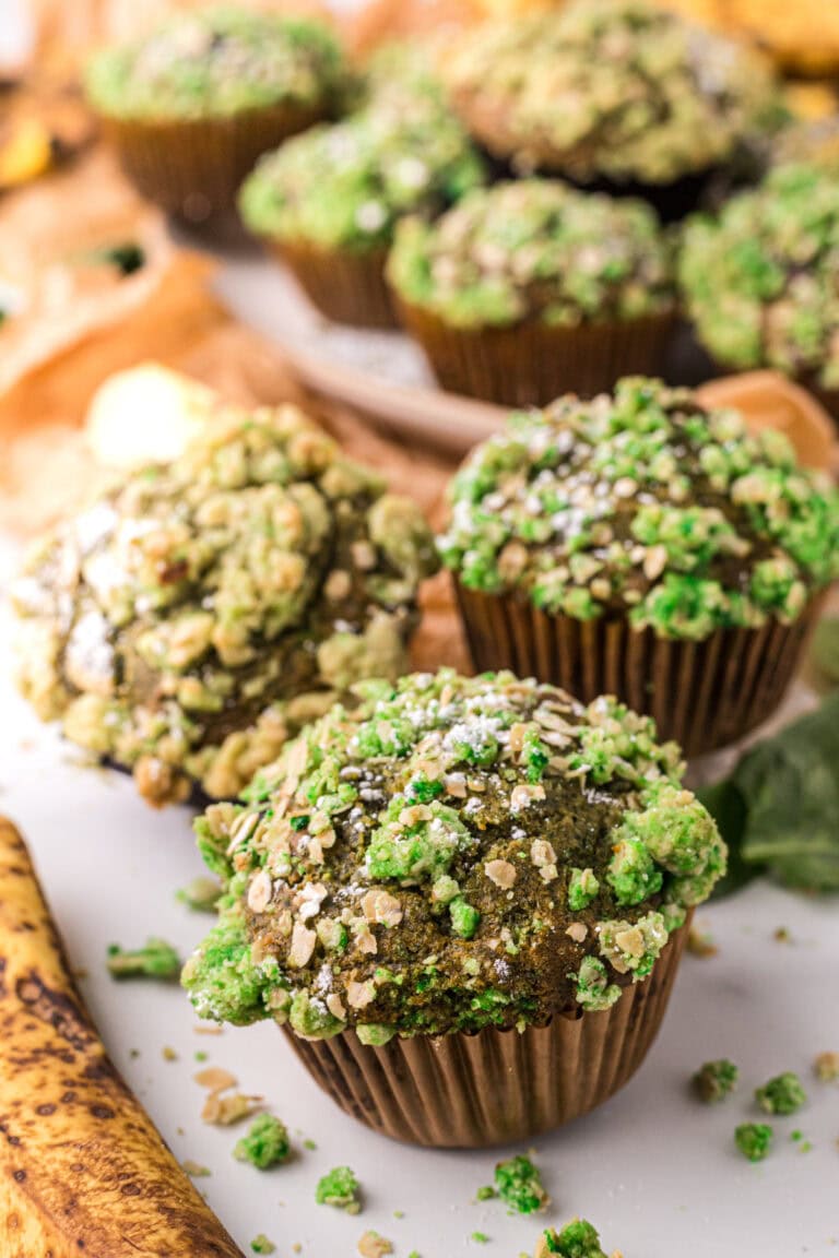 Banana blueberry muffins with a green crumble to look like mold for Halloween.