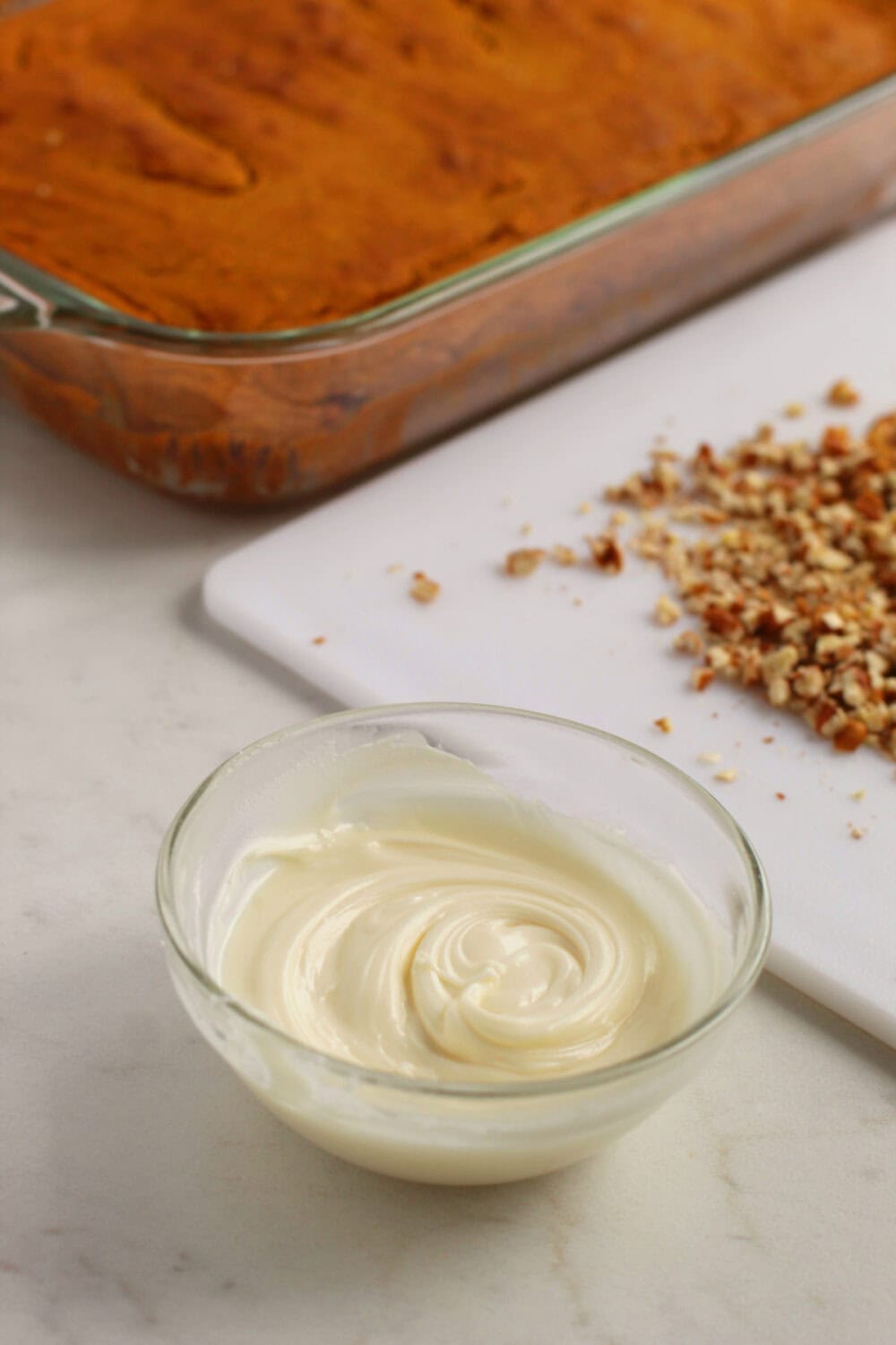 White chocolate topping in a bowl. 