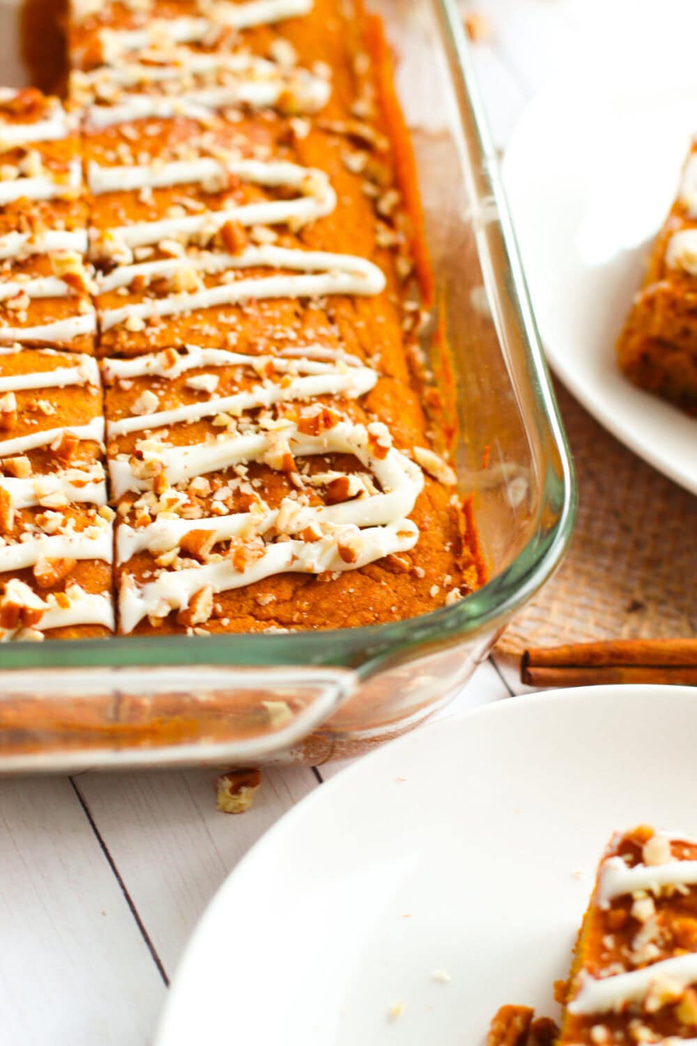 Pumpkin cake bars in a baking pan.