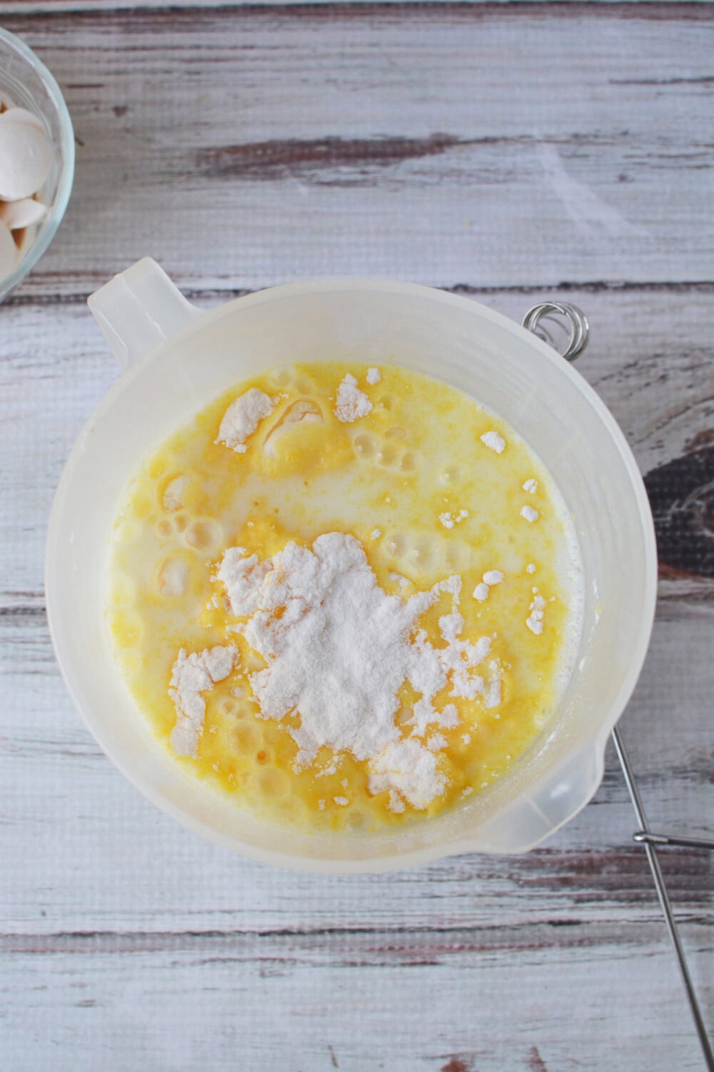 Vanilla pudding in a mixing bowl. 