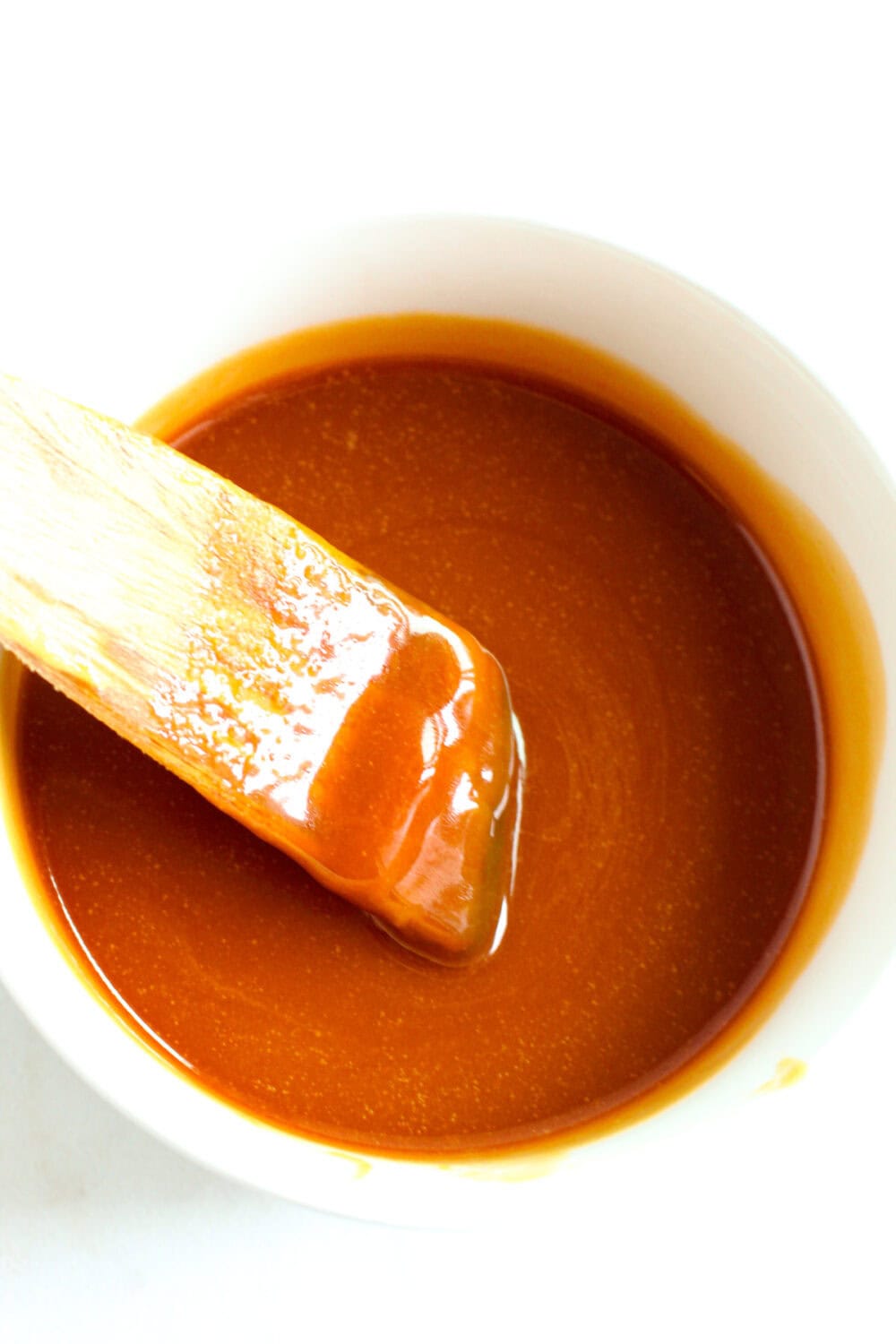 Melted caramel sauce in a bowl. 