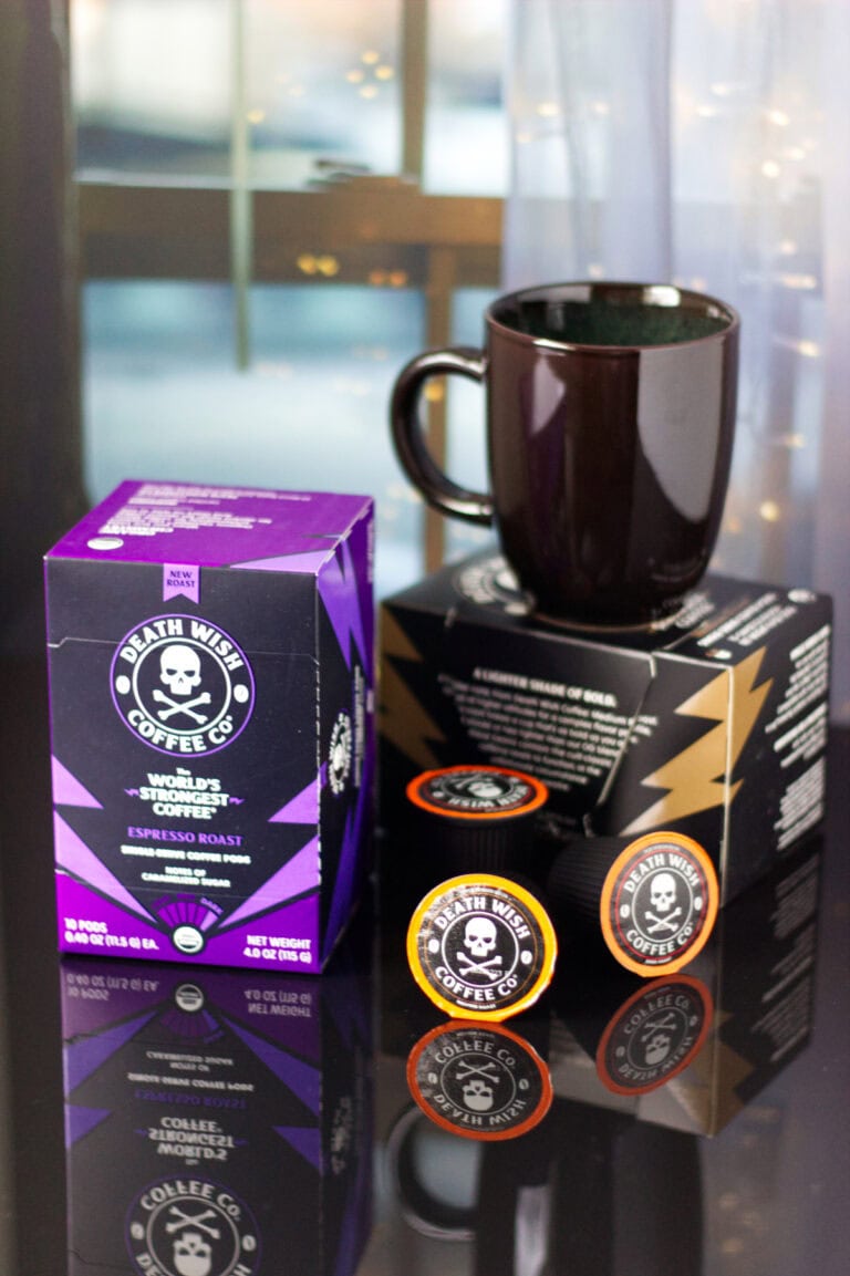 Boxes of Death Wish coffee, K-cups, and a mug.