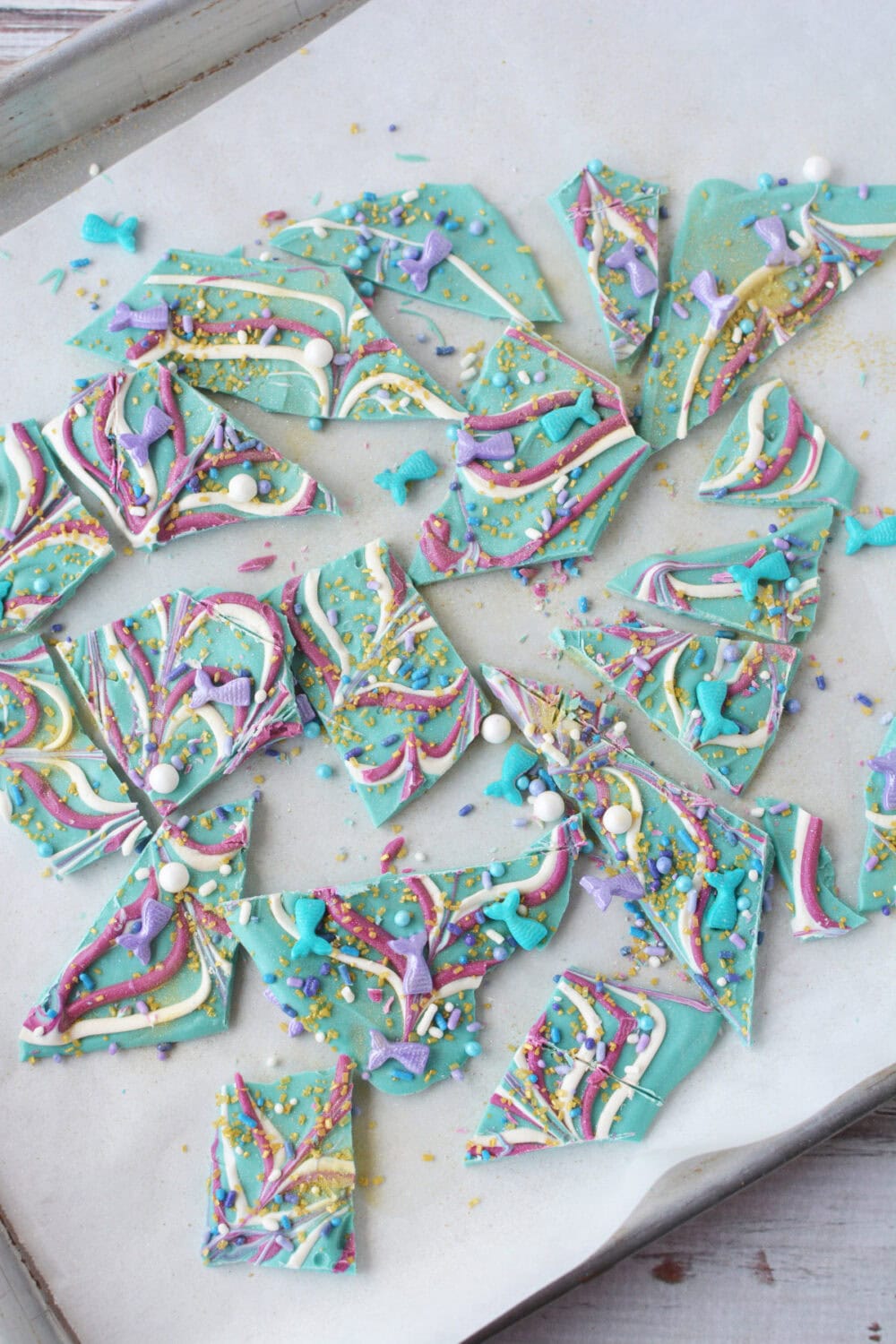 Pieces of mermaid bark candy broken up into pieces. 