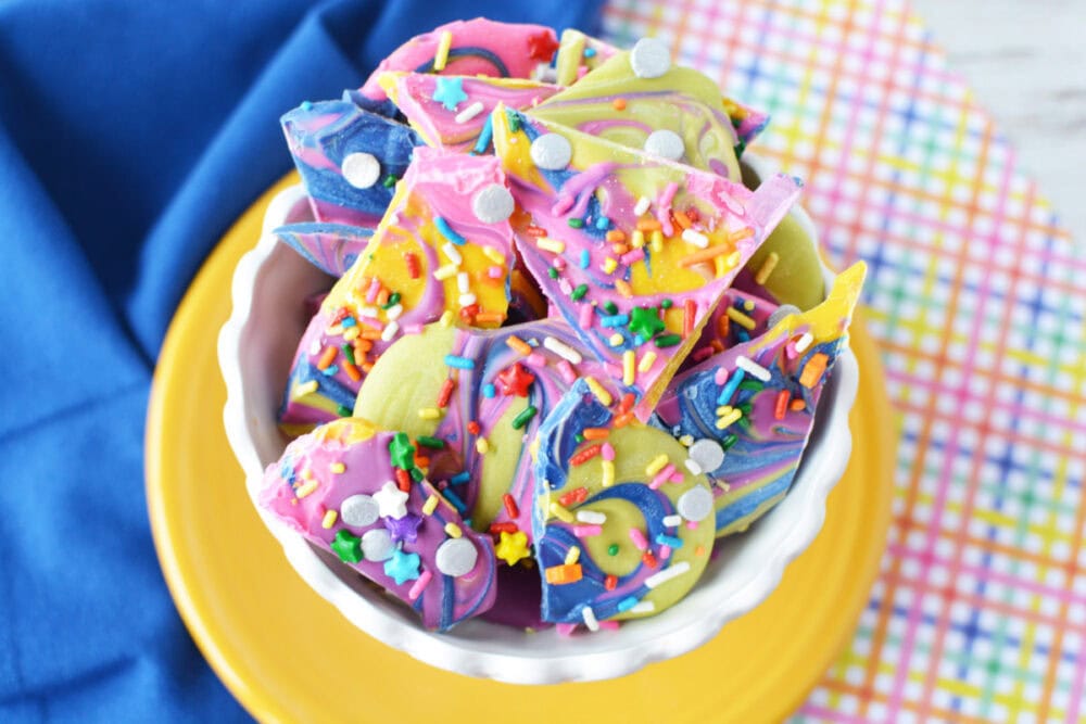 Bowl full of rainbow bark candy. 