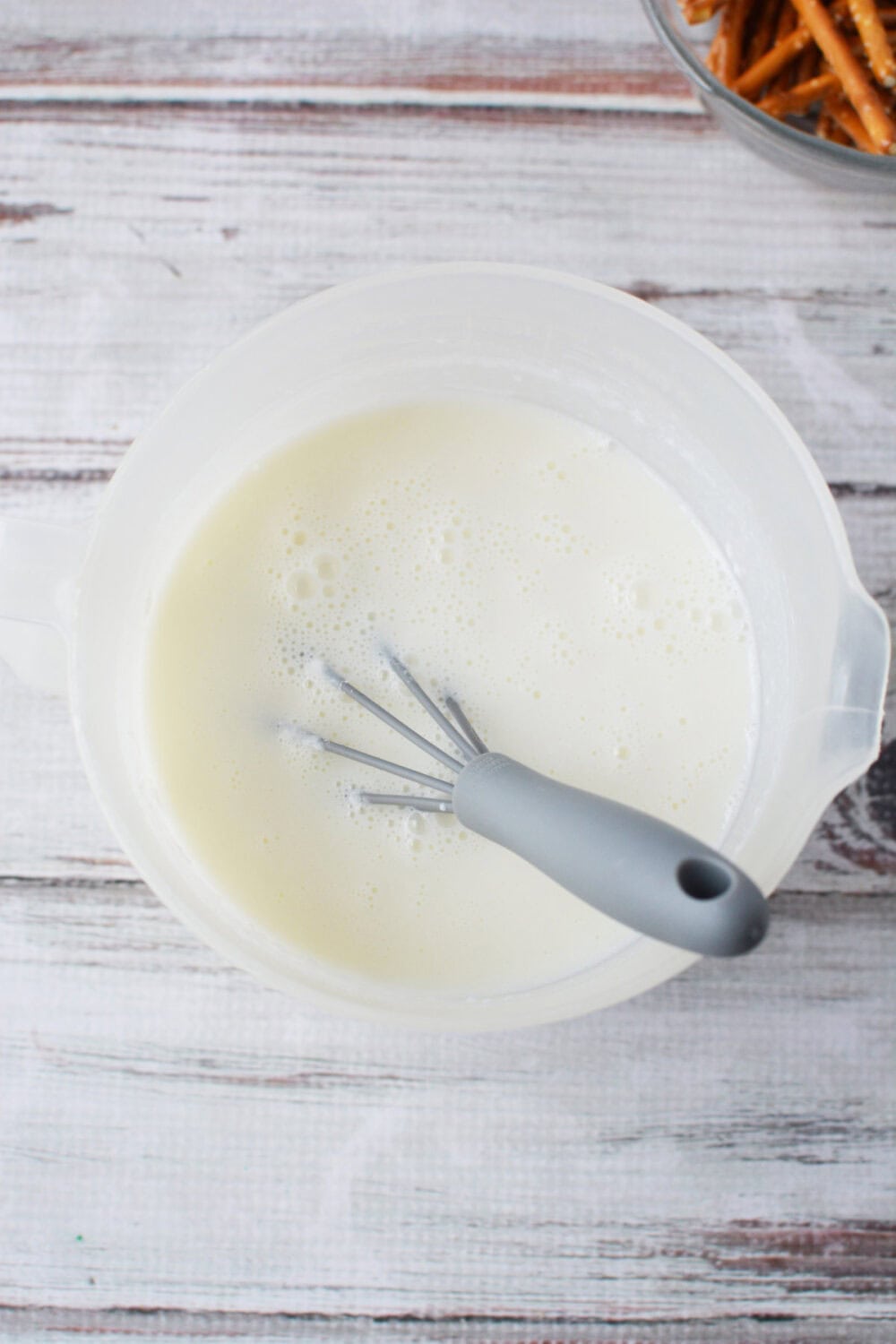 Whisking pudding in a bowl. 