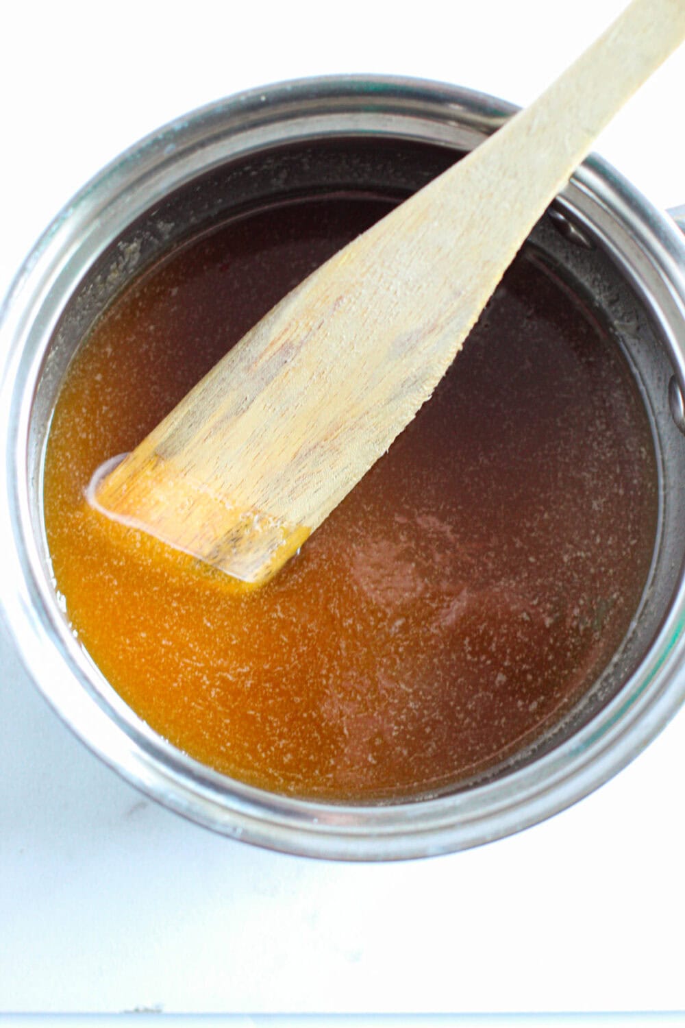 Stirring melted brown sugar mixture. 