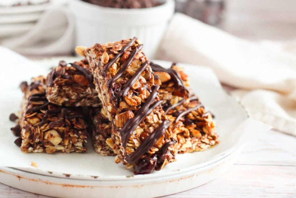 Cherry chocolate granola bars on a plate. 