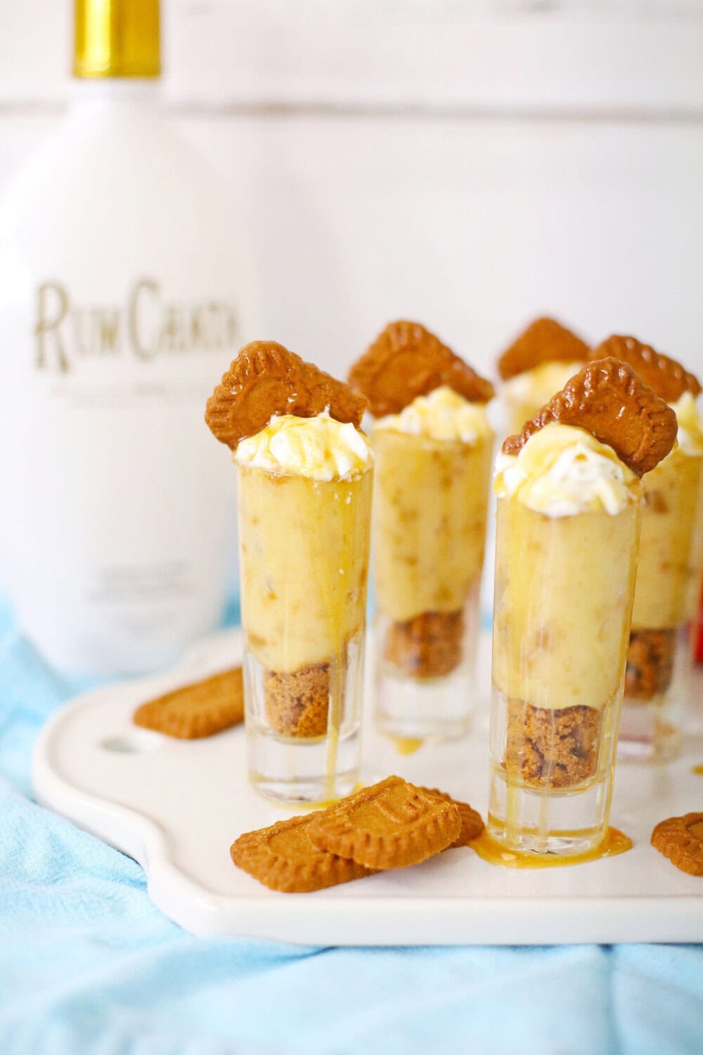 Cookie shots next to the bottle of RumChata. 