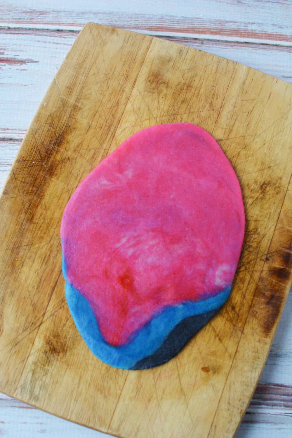 Rolled colored cookie dough. 