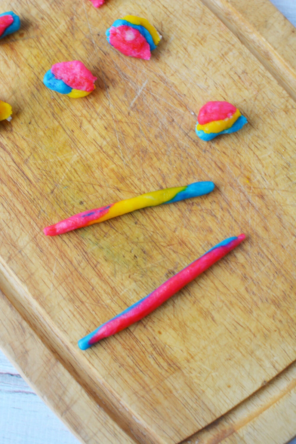 Rolled rainbow shortbread dough. 