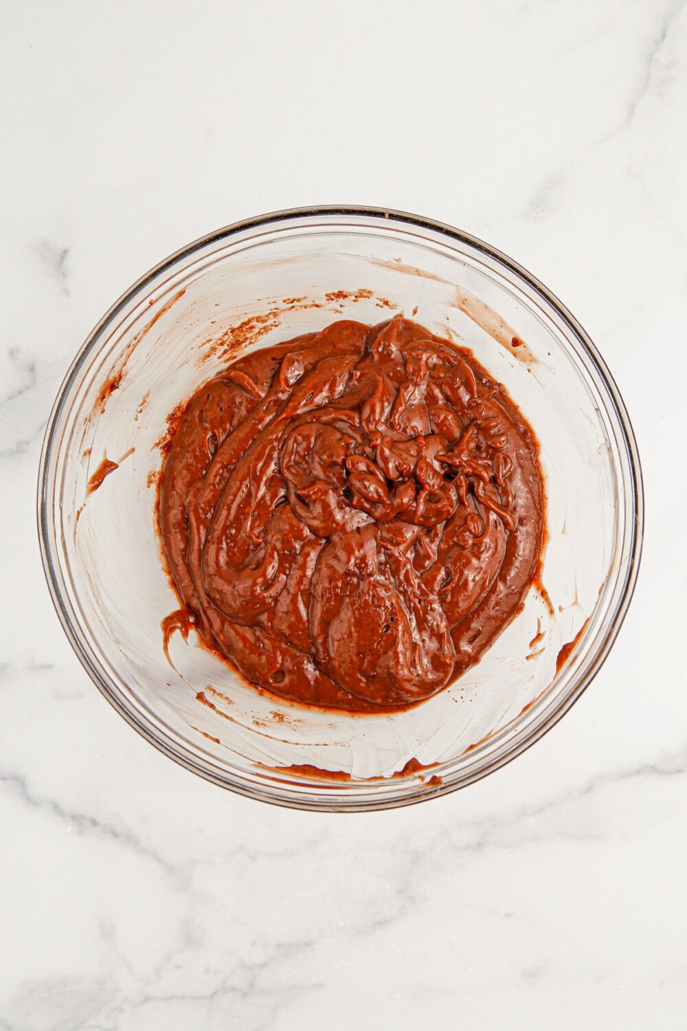 Chocolate pudding mixed in a bowl.