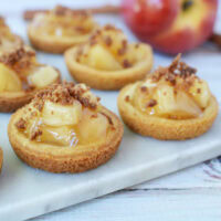 Mini Apple Pie cookies on a board.