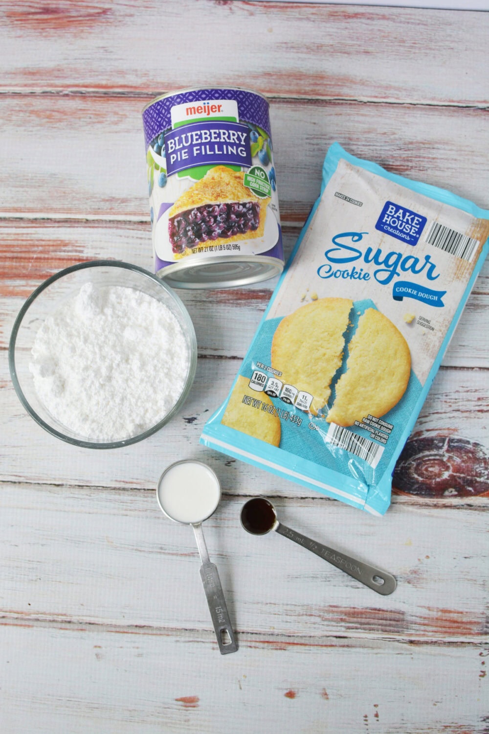 Sugar cookie dough, blueberry pie filling, vanilla, powdered sugar. 