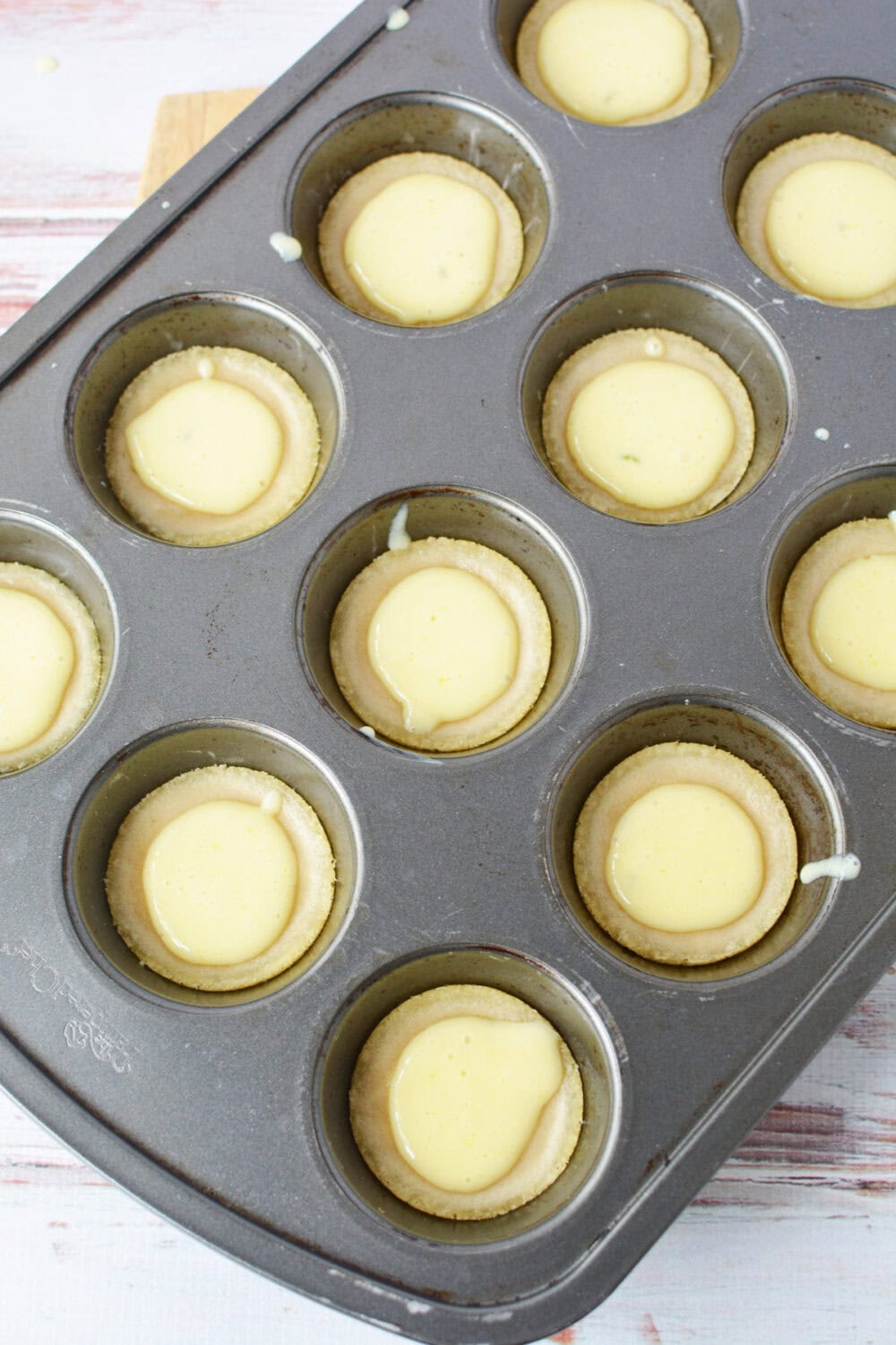 Filled cookie crusts before baking. 