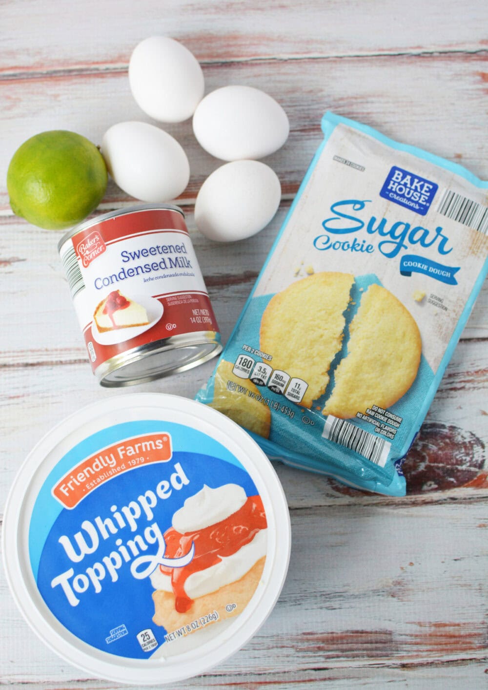 Cake mix, eggs, lime, sweetened condensed milk, and whipped topping. 