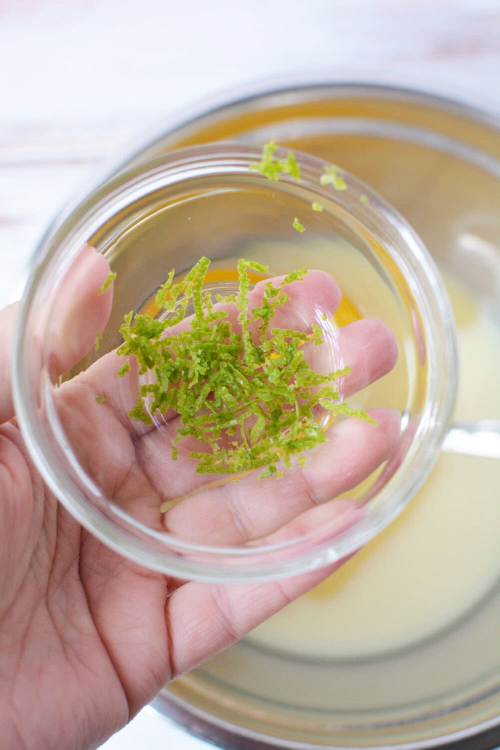 Lime zest in a small bowl. 