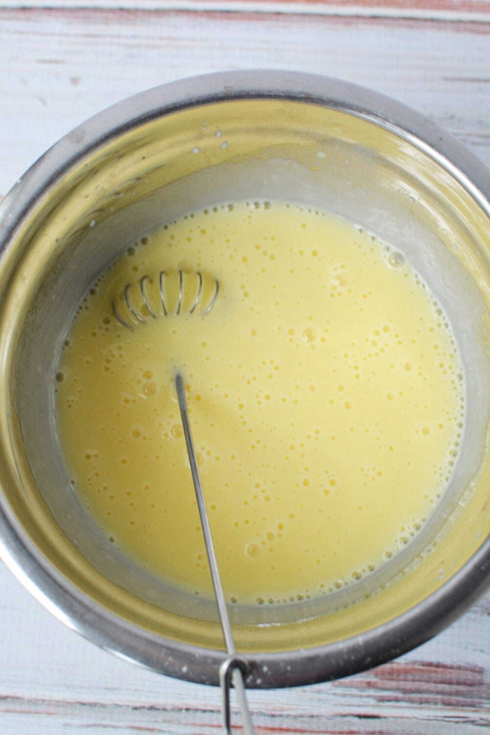 Whisking banana pudding. 