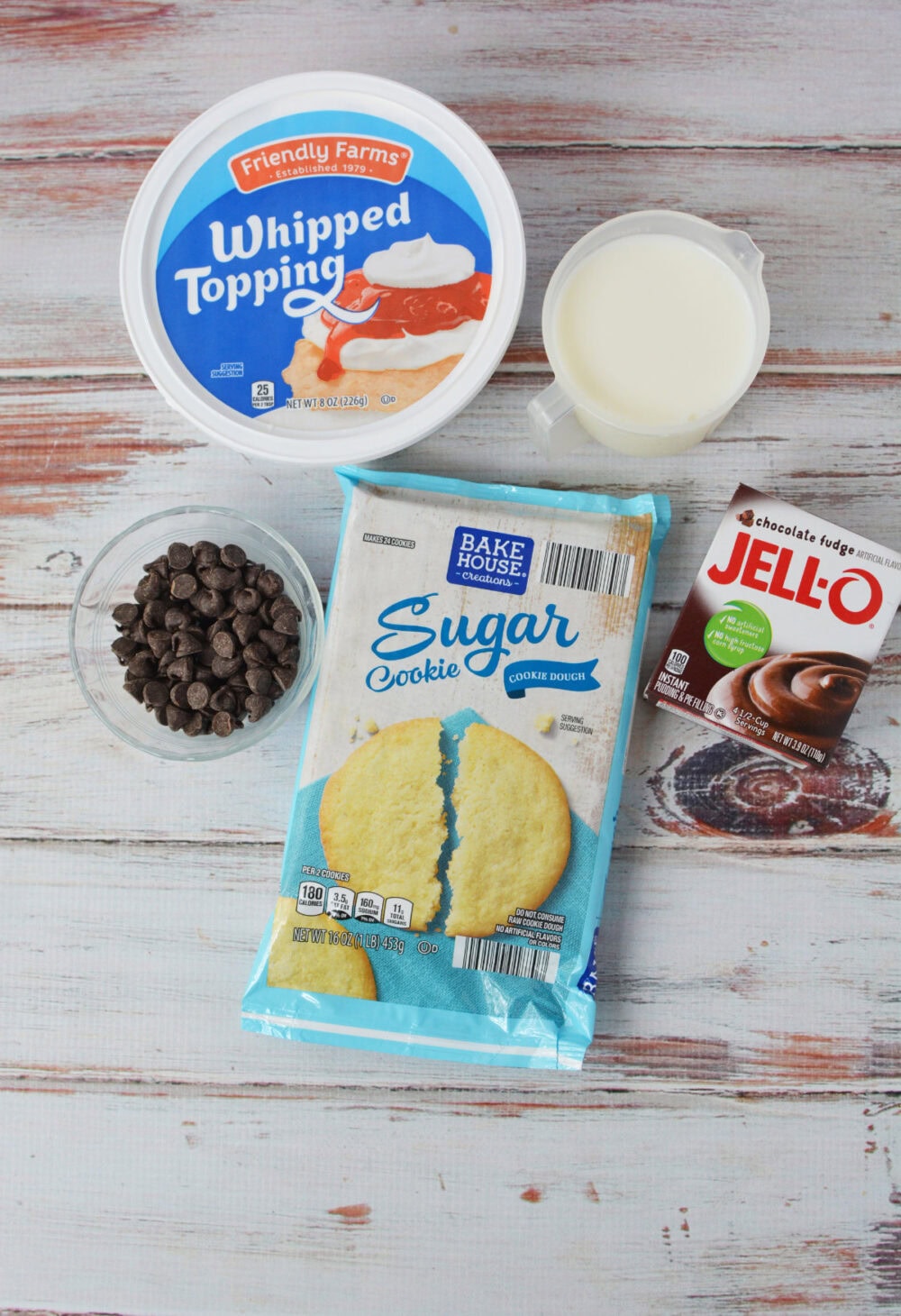 Whipped topping, milk, chocolate shavings, sugar cookie dough, and chocolate pudding mix. 
