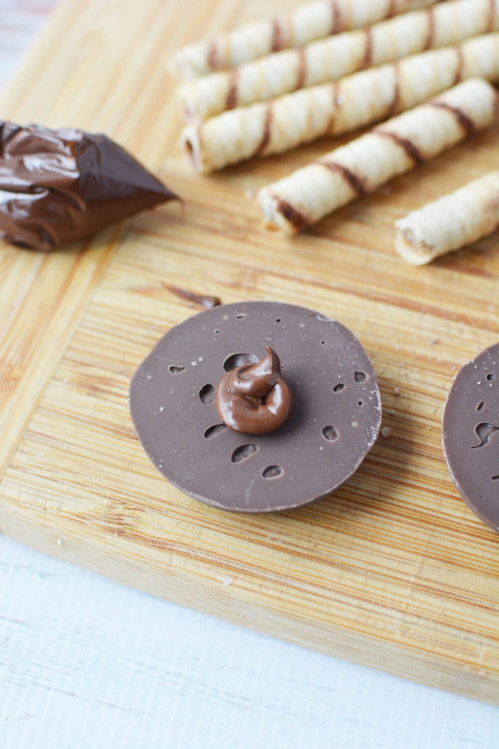 Fudge cookie with melted chocolate on it.