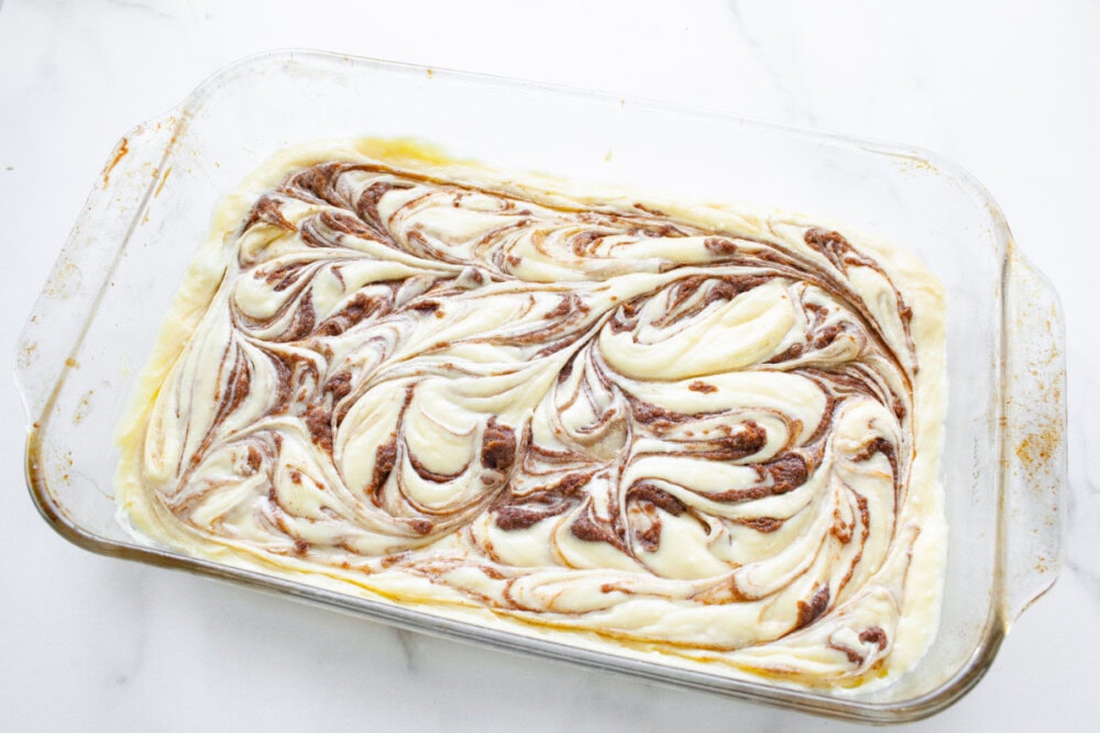 Swirled cinnamon mixture into cake batter in pan.