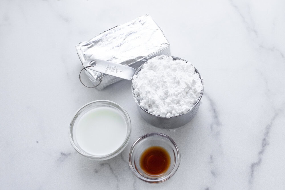 Cream cheese, powdered sugar, milk, and vanilla extract.