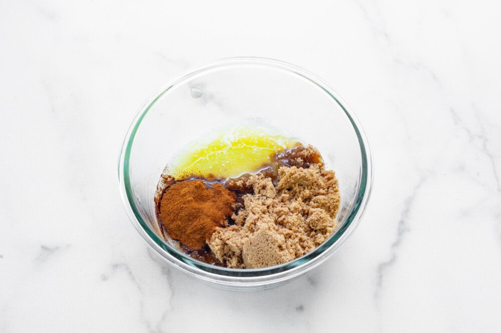 Brown sugar, cinnamon, and butter in a bowl.