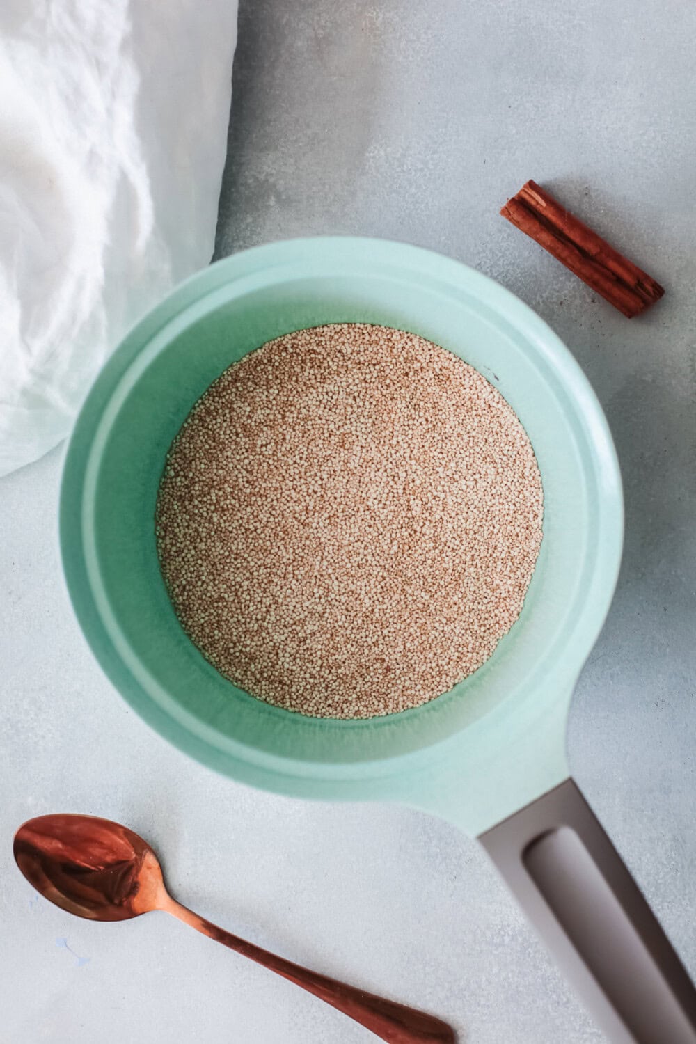Saucepan with quinoa in it.