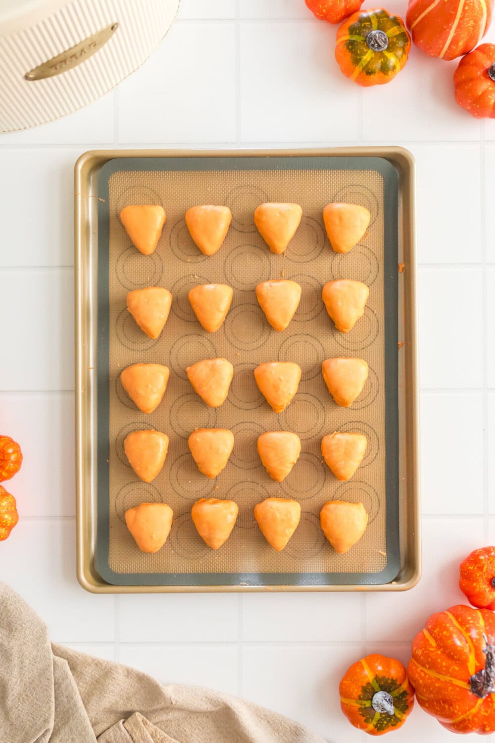 Cake bites dipped in orange melting wafers.