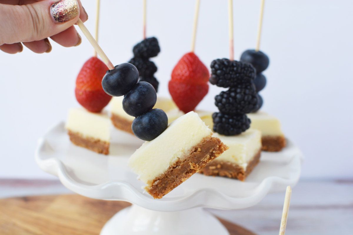Berry and cheesecake bites on skewers