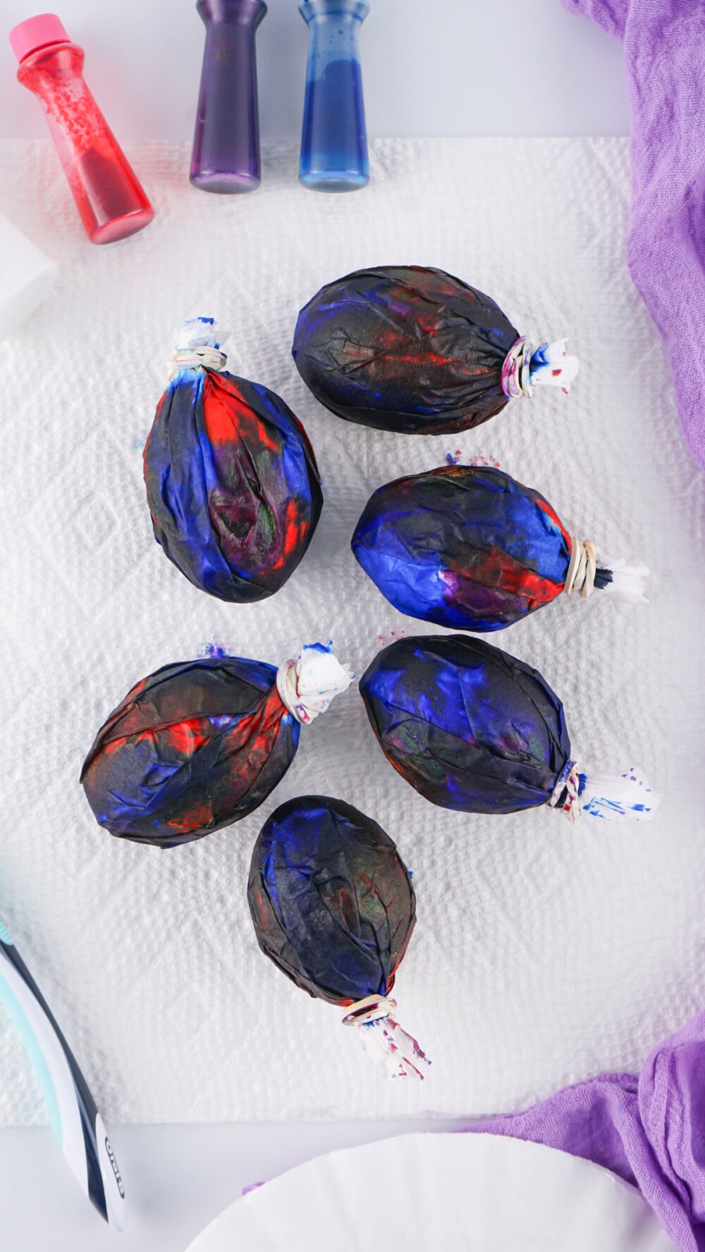 Dyed eggs wrapped in filters.